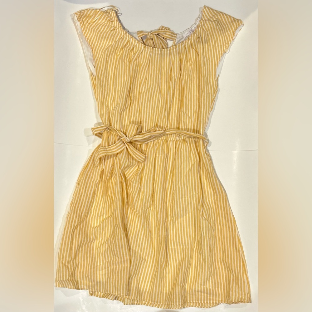 Yellow and cream vertically striped sundress with ribbon cinch belt
